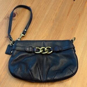 Chic COACH Dark Purple Leather Wristlet with Gold Chain Accent